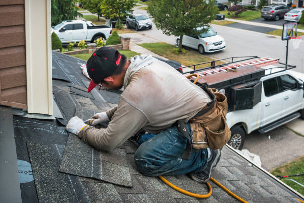 Professional Roof Replacement technician working in Lancaster, NH